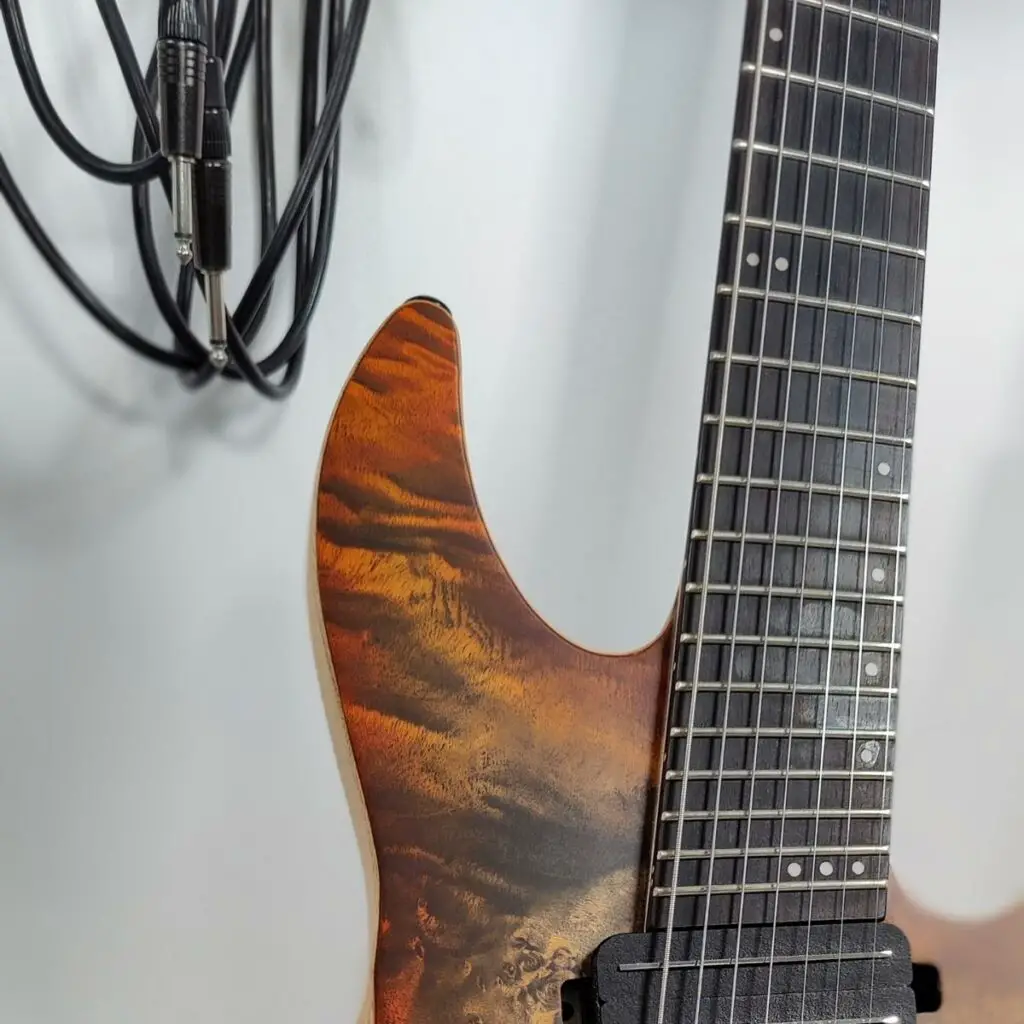 What is a fanned fret guitar